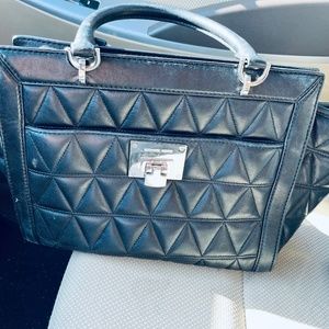 Black quilted Michael kors purse with crossbody strap